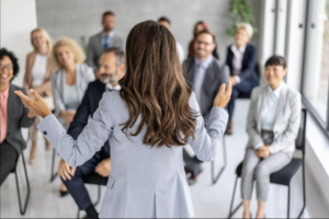 Professional giving an engaging presentation instead of reading from slides