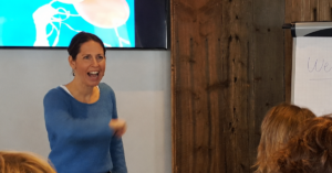 Trainer teaching presentation skills during a Presenting with Impact workshop in Amsterdam